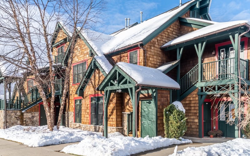 Condos at the Creek townhomes with snow on rooftops