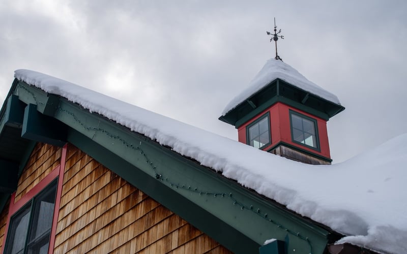 Winter view of Condos at the Creek townhome exteriors