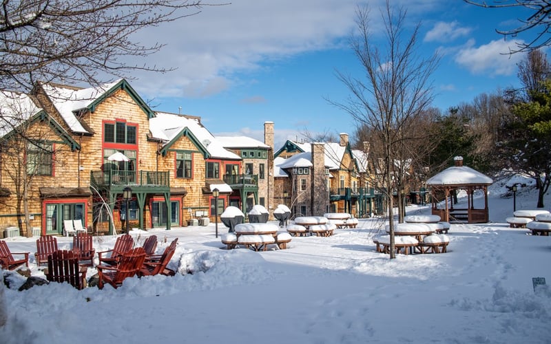 Condos at the Creek buildings in winter landscape